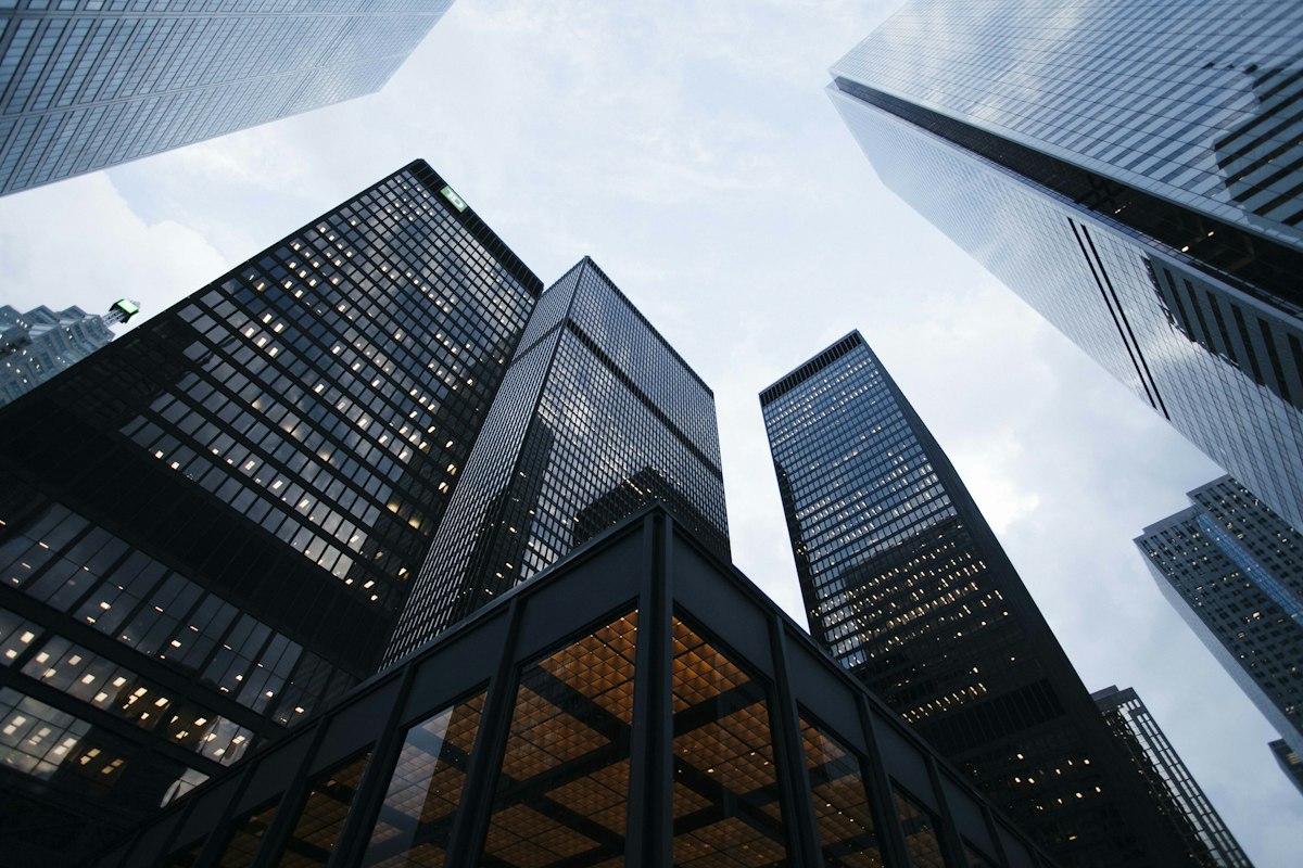 Modern high-rise buildings representing American project markets